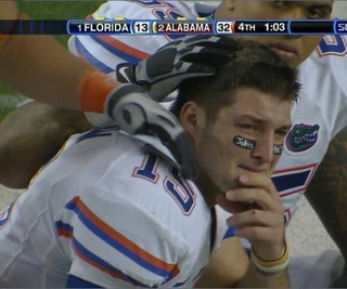 Illustration for article titled Tim Tebow Messiah Watch: See How He Loved Football Edition